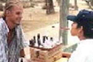 Foto Piña Palmera. Voluntario y jóven con discapacidad.